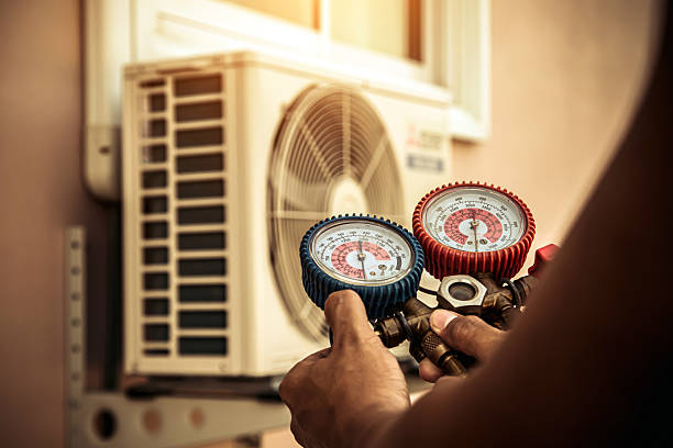 Professional Hvac technician working in Center, CO